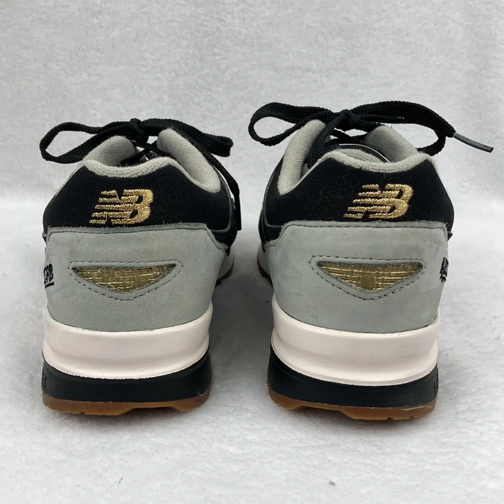 New Balance Women’s Abzorb Black and Gold Sneakers sz 6.5